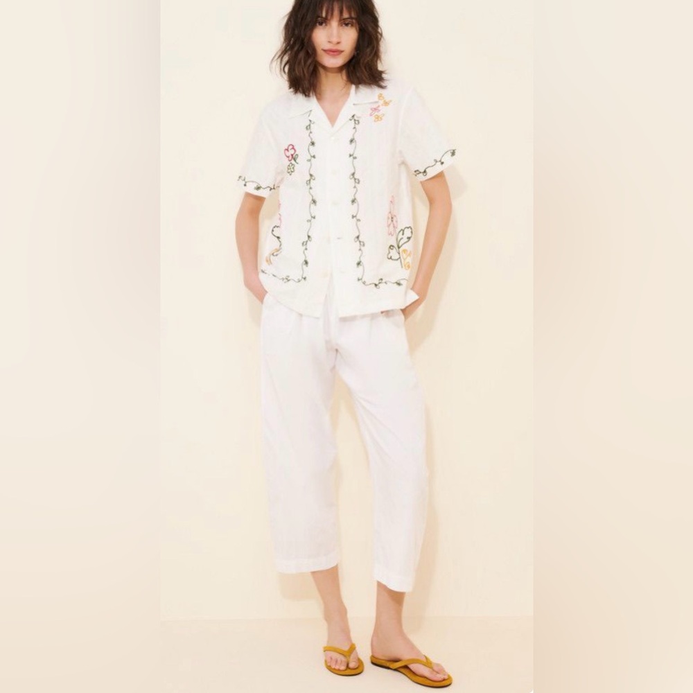 Anthropologie brand Chic White embroidered Top